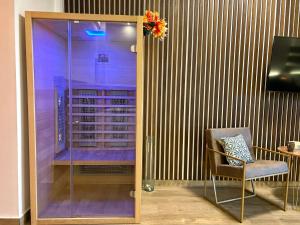 TV a/nebo společenská místnost v ubytování Dragon Nest SPA Concept
