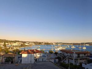 a view of a harbor with boats in the water at Holiday House in Porto Heli