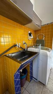 Η κουζίνα ή μικρή κουζίνα στο Casa Maria Fulô