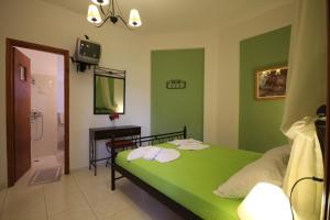 Postel nebo postele na pokoji v ubytování Panorama Rooms