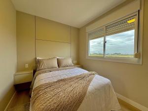 Postel nebo postele na pokoji v ubytování Apartamento Alto Padrão