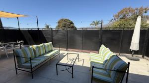 two chairs and a table on a patio at Ajijic San Antonio Lake Chapala Villas - Pickleball Court - Gym in San Antonio