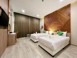 TV a/nebo společenská místnost v ubytování Asawann Hotel Suvarnabhumi + 27 fotografií