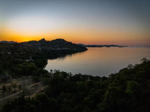 a view of a lake at sunset at Golo Nuk in Komodo Labuan Bajo Airport
