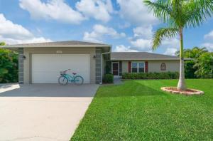 a house with a bike parked in the garage at 1209 Marco Island in Marco Island