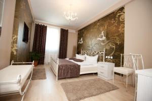 Llit o llits en una habitació de Hotel Poarta Transilvaniei