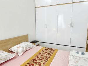 Postel nebo postele na pokoji v ubytování Chill House 702TM3