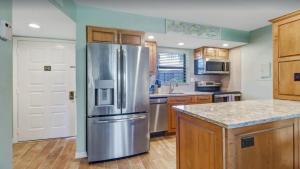 Η κουζίνα ή μικρή κουζίνα στο Cozy 1BDRM Condo - Pool Access