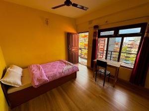 מיטה או מיטות בחדר ב-HOTEL FORESTWAY Hostel & Backpackers