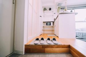 Fotografija u galeriji objekta Minimalist Loft Namba Compact Studio with a 24-hour Gym MA1003 u Osaki