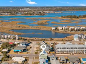 an aerial view of a small town next to a river at Shore Sounds Fun in Surf City