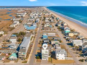 an aerial view of a town next to the beach at Shore Sounds Fun in Surf City
