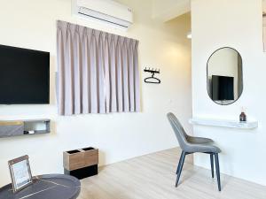 Een TV en/of entertainmentcenter bij 沙沙民宿
