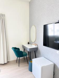 Een TV en/of entertainmentcenter bij 沙沙民宿
