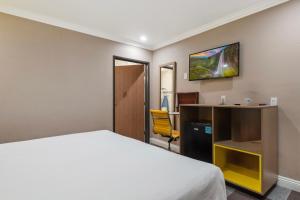 Postel nebo postele na pokoji v ubytování Hotel H-Wood