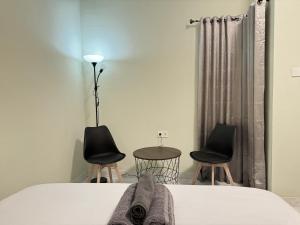 Postel nebo postele na pokoji v ubytování Pause Inn guesthouse