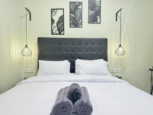 Postel nebo postele na pokoji v ubytování Pause Inn guesthouse