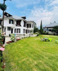 Zahrada ubytování Busybee Guest House