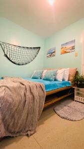 Postel nebo postele na pokoji v ubytování Tierra Bella-Exclusive Beachfront Villa at Elyu + 37 fotografií