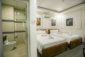 Koupelna v ubytování Ngọc Châu Hotel + 37 fotografií