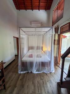 Voodi või voodid majutusasutuse Abraham Beach House toas