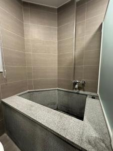Ein Badezimmer in der Unterkunft 無門禁24小時進出-遇見礁溪lll免費停車