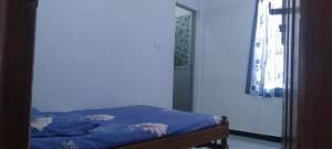 Postel nebo postele na pokoji v ubytování Trintrip Residence