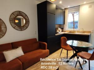 Кухня или мини-кухня в La Grange aux fées Amnéville
