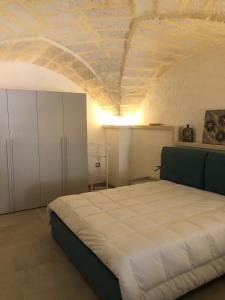 Katil atau katil-katil dalam bilik di Salento casa vacanze vicino Castro Otranto