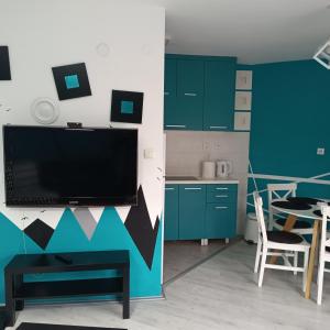Kuchyň nebo kuchyňský kout v ubytování Studio Triangle Divcibare