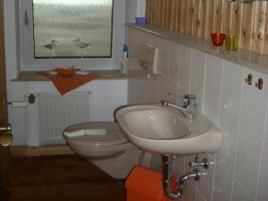 Koupelna v ubytování Ferienhaus Neuenrade + 7 fotografií