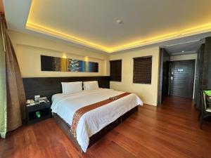 Postel nebo postele na pokoji v ubytování R-Mar Resort and Spa Patong, Phuket