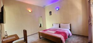 Postel nebo postele na pokoji v ubytování Sparkles Resort