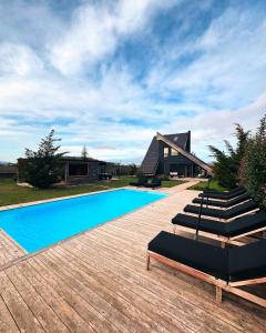 Bazén v ubytovaní Zoe Luxury House alebo v jeho blízkosti