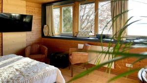 TV a/nebo společenská místnost v ubytování Strandhotel Kärntnerhof