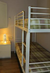 A bed or beds in a room at Apartment Sant Francesc