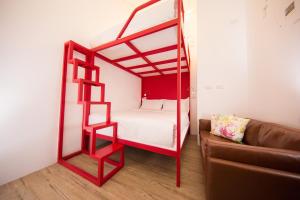 Postel nebo postele na pokoji v ubytování SleepBox Hostel