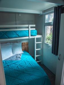 Postel nebo postele na pokoji v ubytování Camping Le Calypso 5 étoiles