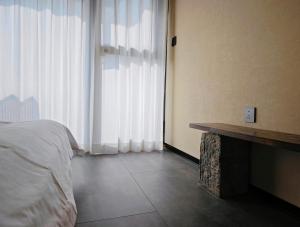 Letto o letti in una camera di 寺外茶宿SiWai tea&house