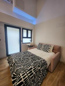 Postel nebo postele na pokoji v ubytování kala-mar Valencia