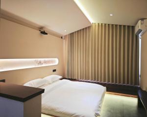 Letto o letti in una camera di 寺外茶宿SiWai tea&house