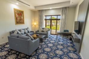 TV a/nebo společenská místnost v ubytování Vista Hotel Tabuk