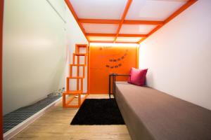 Postel nebo postele na pokoji v ubytování SleepBox Hostel