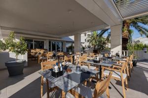 Reštaurácia alebo iné gastronomické zariadenie v ubytovaní Hotel Laurentum