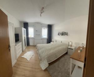 Un ou plusieurs lits dans un hébergement de l'établissement Ferienwohnung in der Mitte von Eisenach