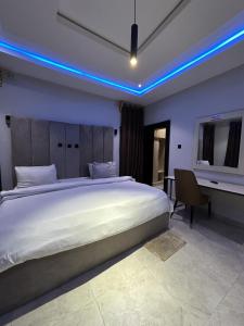 Rúm í herbergi á Lavera Hotel