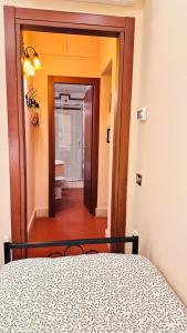 Postel nebo postele na pokoji v ubytování Hotel 4 Coronati