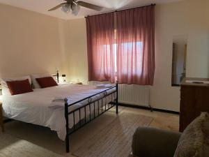 Postel nebo postele na pokoji v ubytování Baytna Hotel