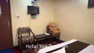 TV a/nebo společenská místnost v ubytování Hotel Yog Darshan