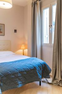 A bed or beds in a room at Affittacamere Zanobi 45